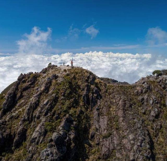 Summit cross of Volcán Barú above the clouds, Chiriquí